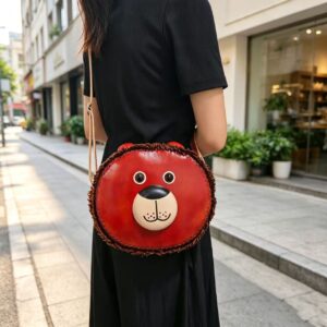 cowhide lion cross body bag