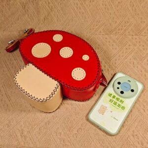cowhide mushroom cross body bag